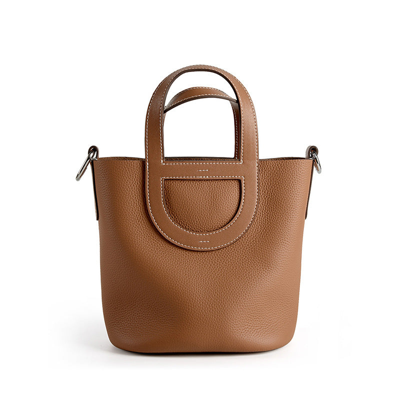 Full-Grain Leather Bucket Bag  Minimalist Cutout Tote with Modern Patchwork Design