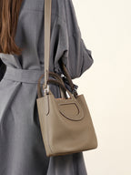 Full-Grain Leather Bucket Bag  Minimalist Cutout Tote with Modern Patchwork Design