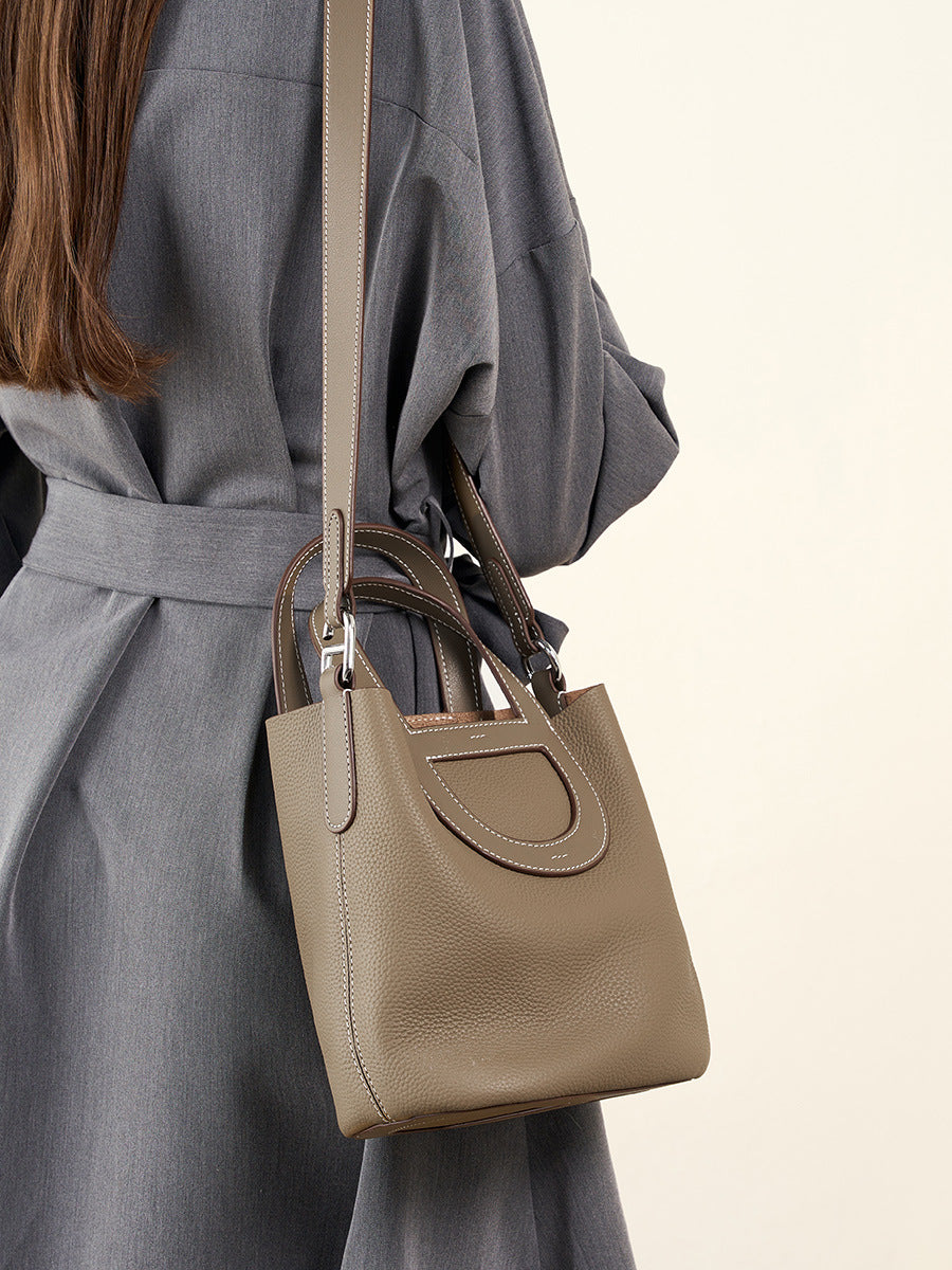 Full-Grain Leather Bucket Bag  Minimalist Cutout Tote with Modern Patchwork Design
