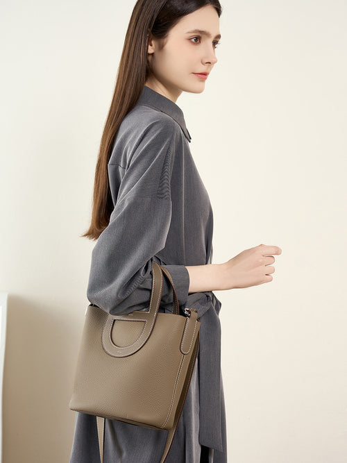 Full-Grain Leather Bucket Bag  Minimalist Cutout Tote with Modern Patchwork Design