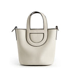 Full-Grain Leather Bucket Bag  Minimalist Cutout Tote with Modern Patchwork Design