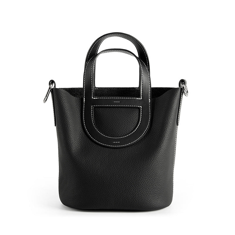 Full-Grain Leather Bucket Bag  Minimalist Cutout Tote with Modern Patchwork Design