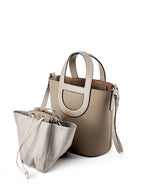 Full-Grain Leather Bucket Bag  Minimalist Cutout Tote with Modern Patchwork Design